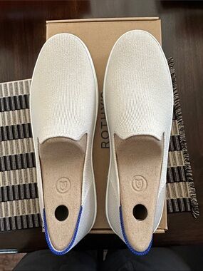 Rothy's Women’s  Slip-On Sneakers in Sand with Blue Trim